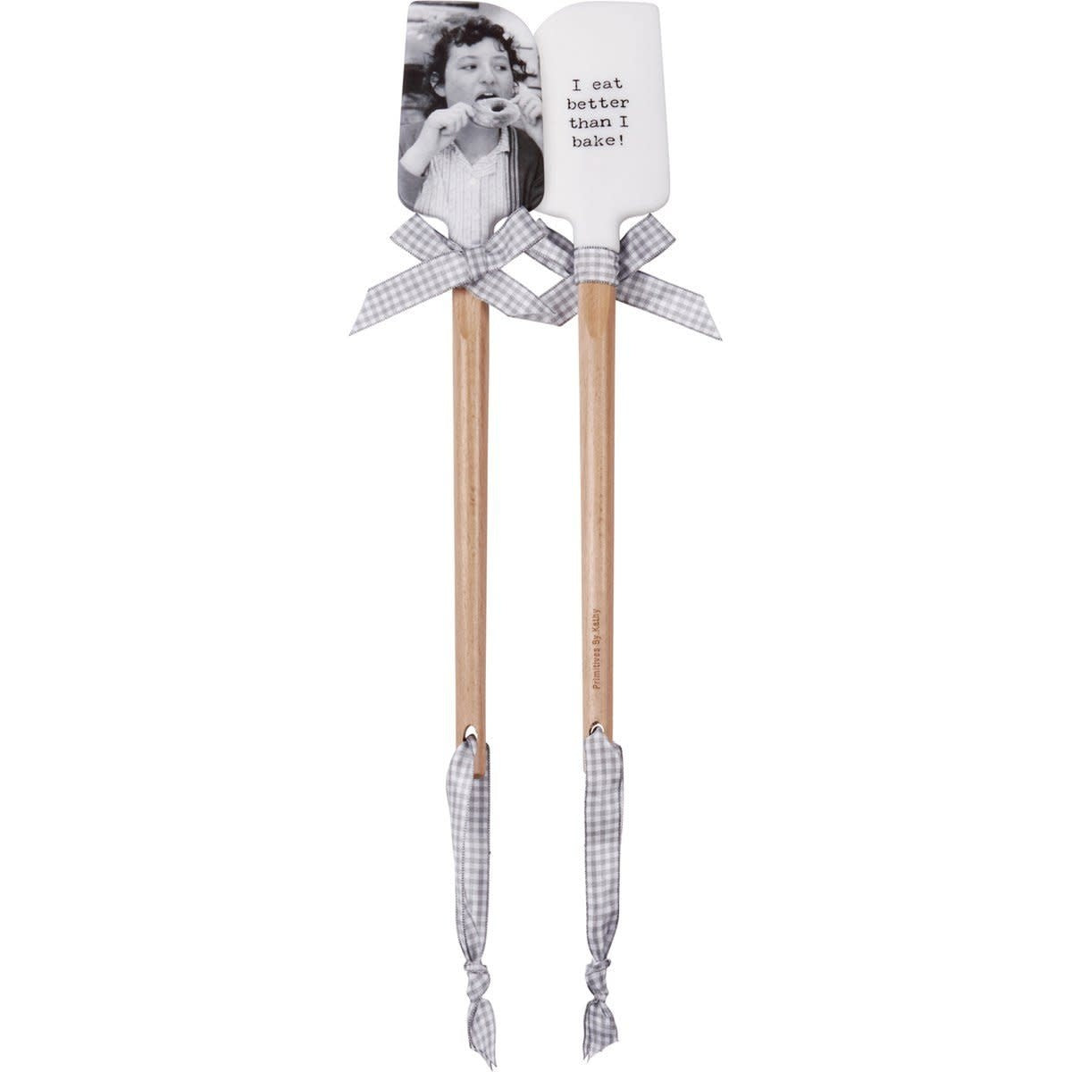Double-sided silicone spatula with wooden handle; one side shows vintage photo print, other has 'I Eat Better Than I Bake' text and gray-white gingham bow.