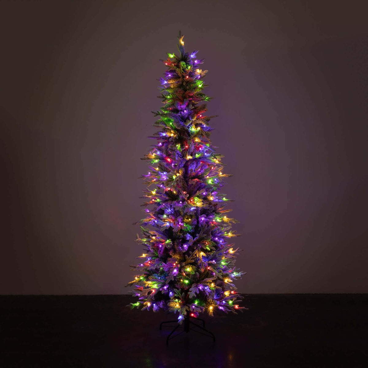 7.5-foot white plastic LED pencil tree with flocked snow texture and warm multi-color lights.