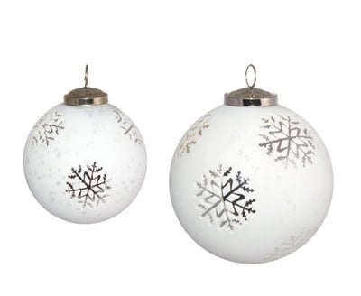Glass snowflake ornament with white ball base measuring 4.75 inches tall.