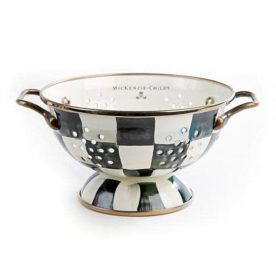 Small Courtly Check enamel colander with hand-painted pink pattern on steel body and bronzed stainless rim.