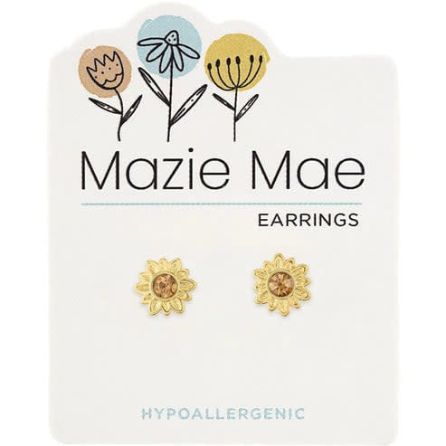 Gold Mazie Mae earring featuring a polished gold finish with an intricate filigree silhouette and dangling design.