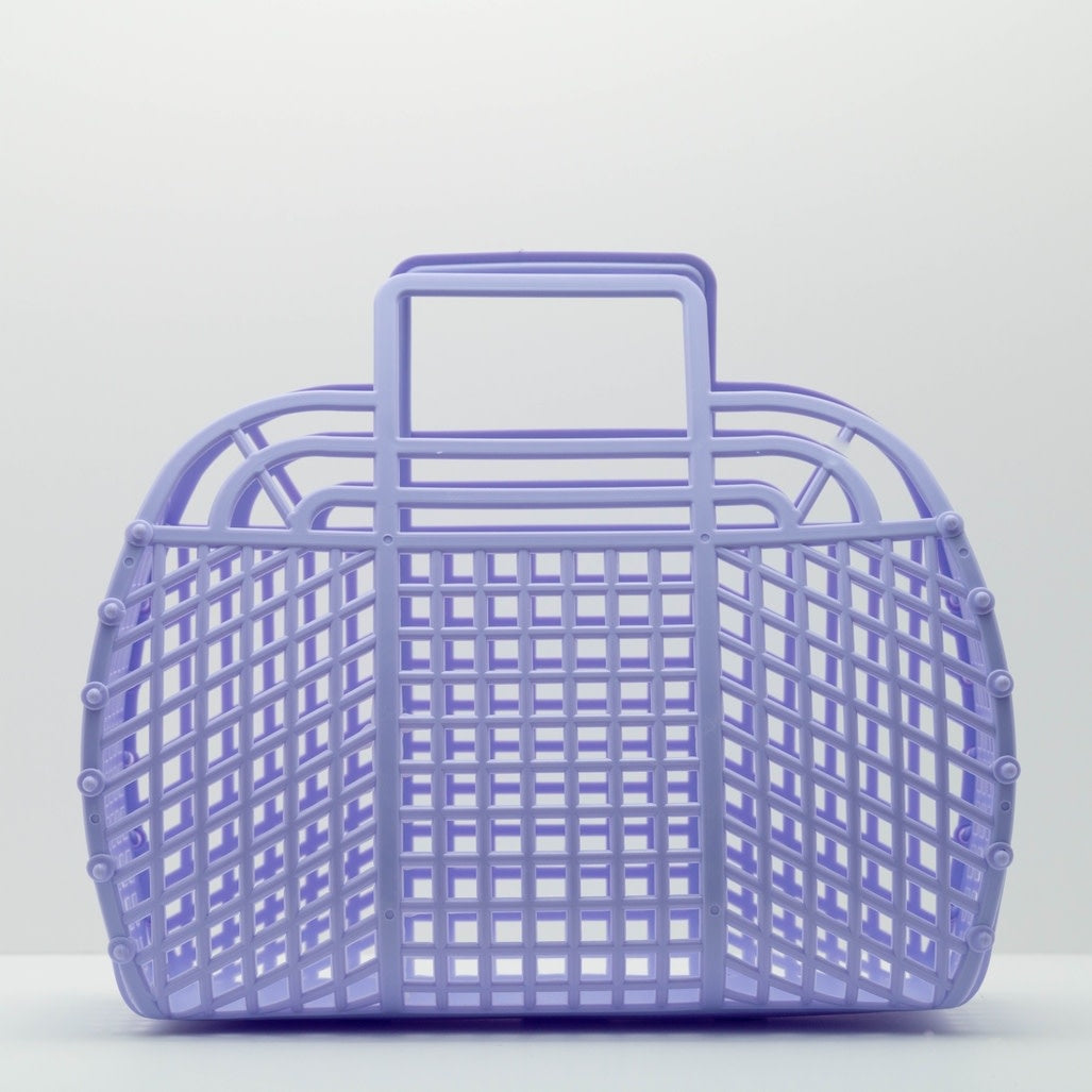 Large retro jelly basket in translucent blue with beadwork handles.