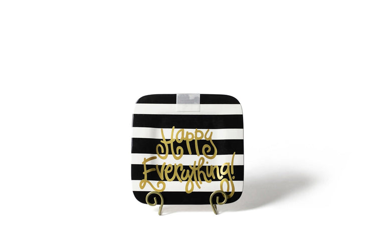 Ceramic mini platter with black stripe pattern featuring a happy face silhouette.