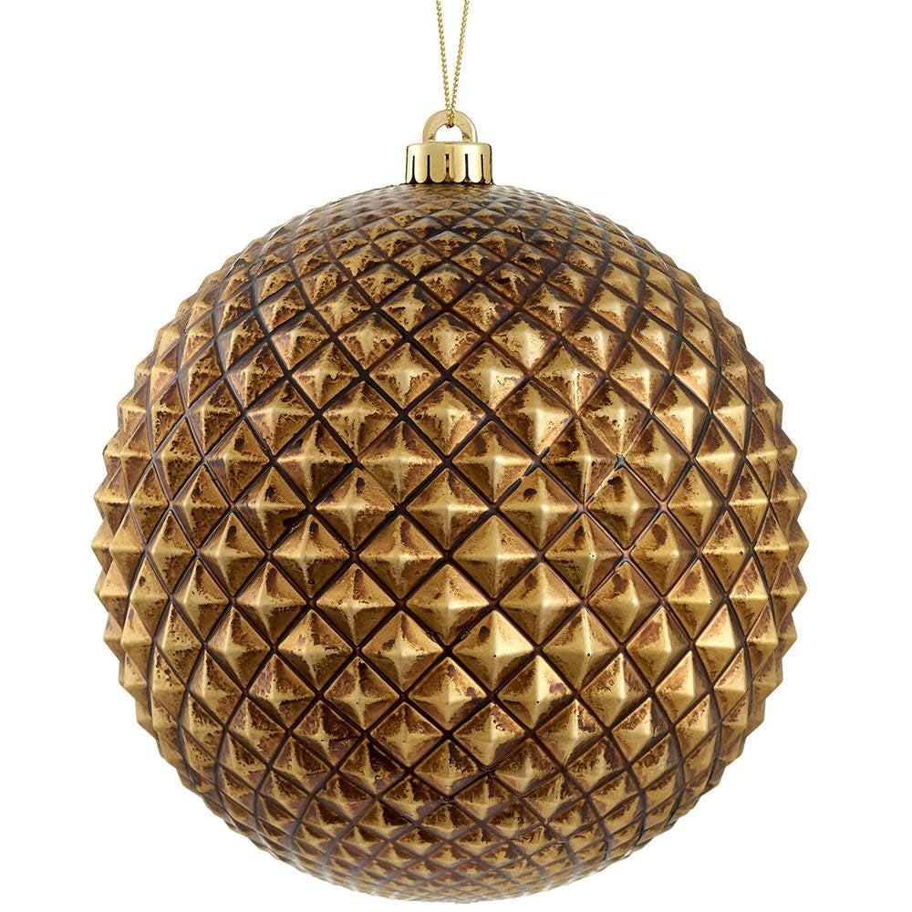 Eight-inch antique gold plastic ball ornament with a vintage finish.