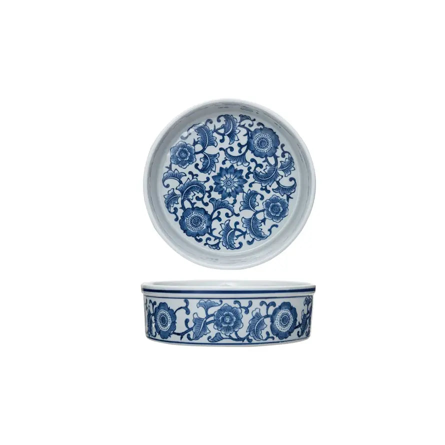 Round stoneware pet bowl with floral pattern in earthy tones