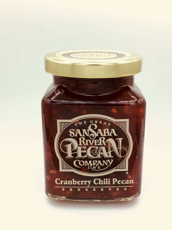 8 oz glass jar with fired-on logo showing Texas cranberries, pecans, and chili in a preserve.