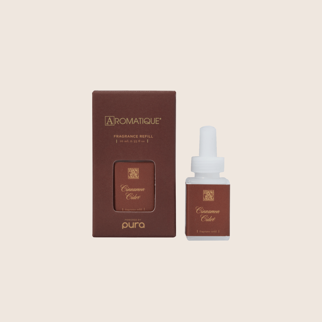 Cinnamon Cider Pura Refill bottle with cinnamon spice scent in a small boxed container.