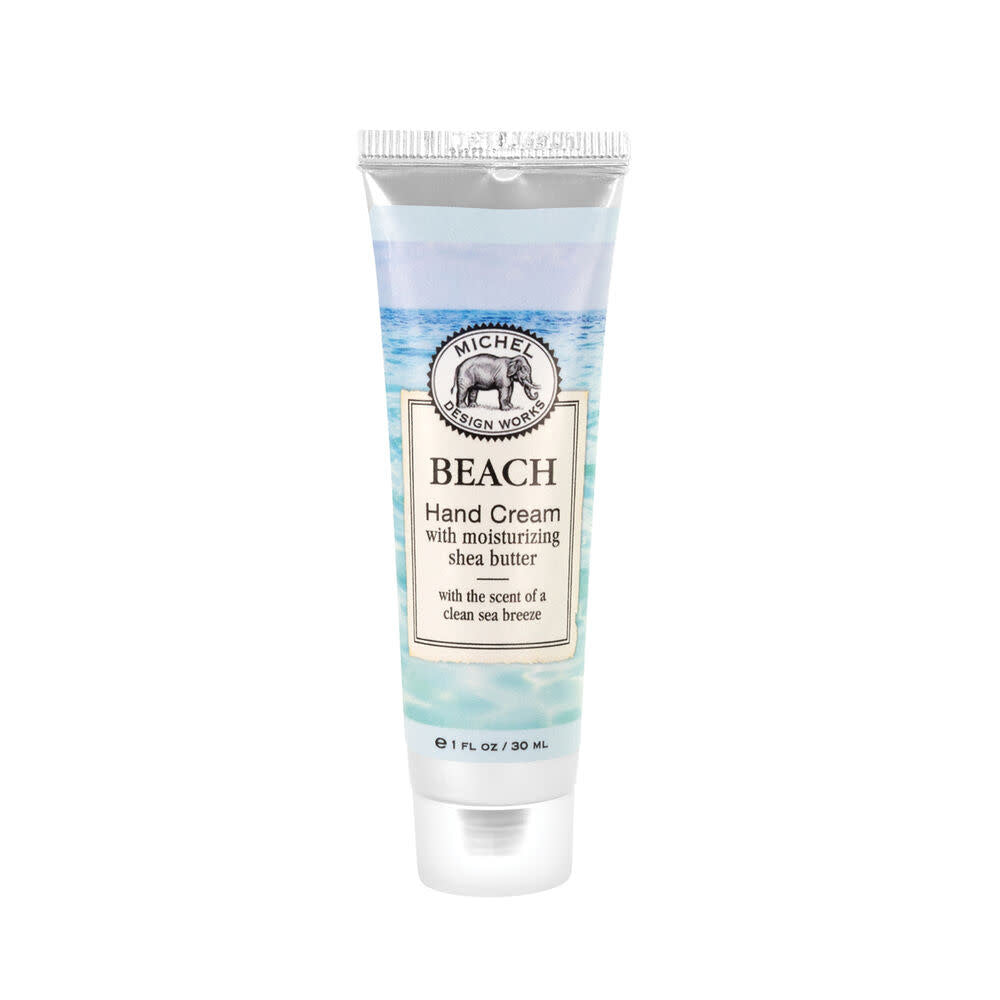 Mini tube hand cream in honey almond scent with sweet almond, cherry, vanilla, and honey notes.