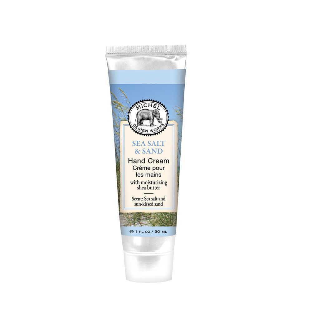 Mini tube hand cream with honey almond fragrance in a beige container.