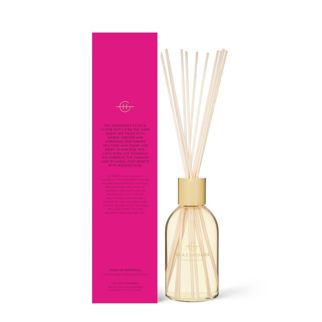 8.4 fl oz glass diffuser bottle with white floral bouquet label featuring sugar cane and orchid notes.