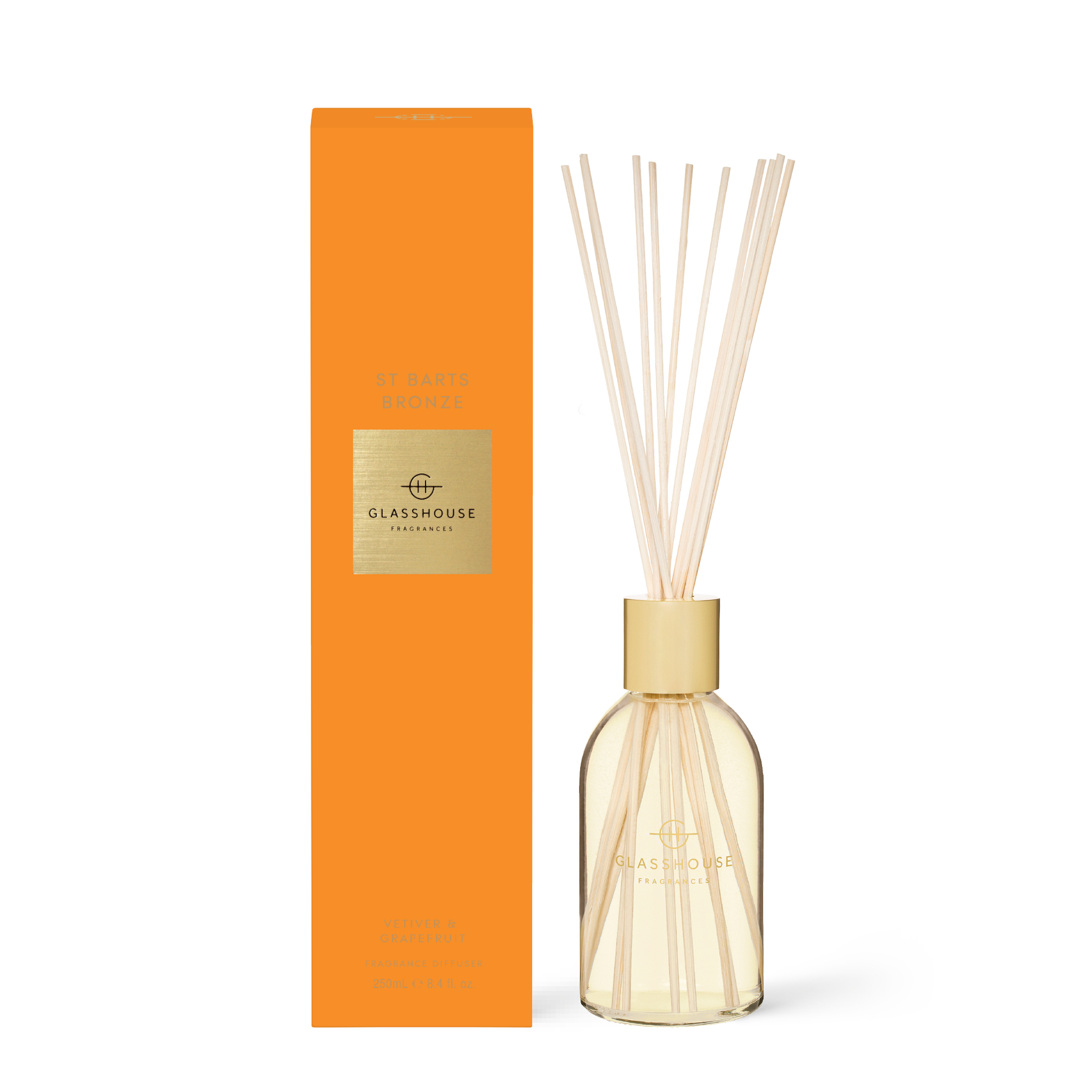 Bronze glass reed diffuser bottle with white liquid labeled St Barts Bronze