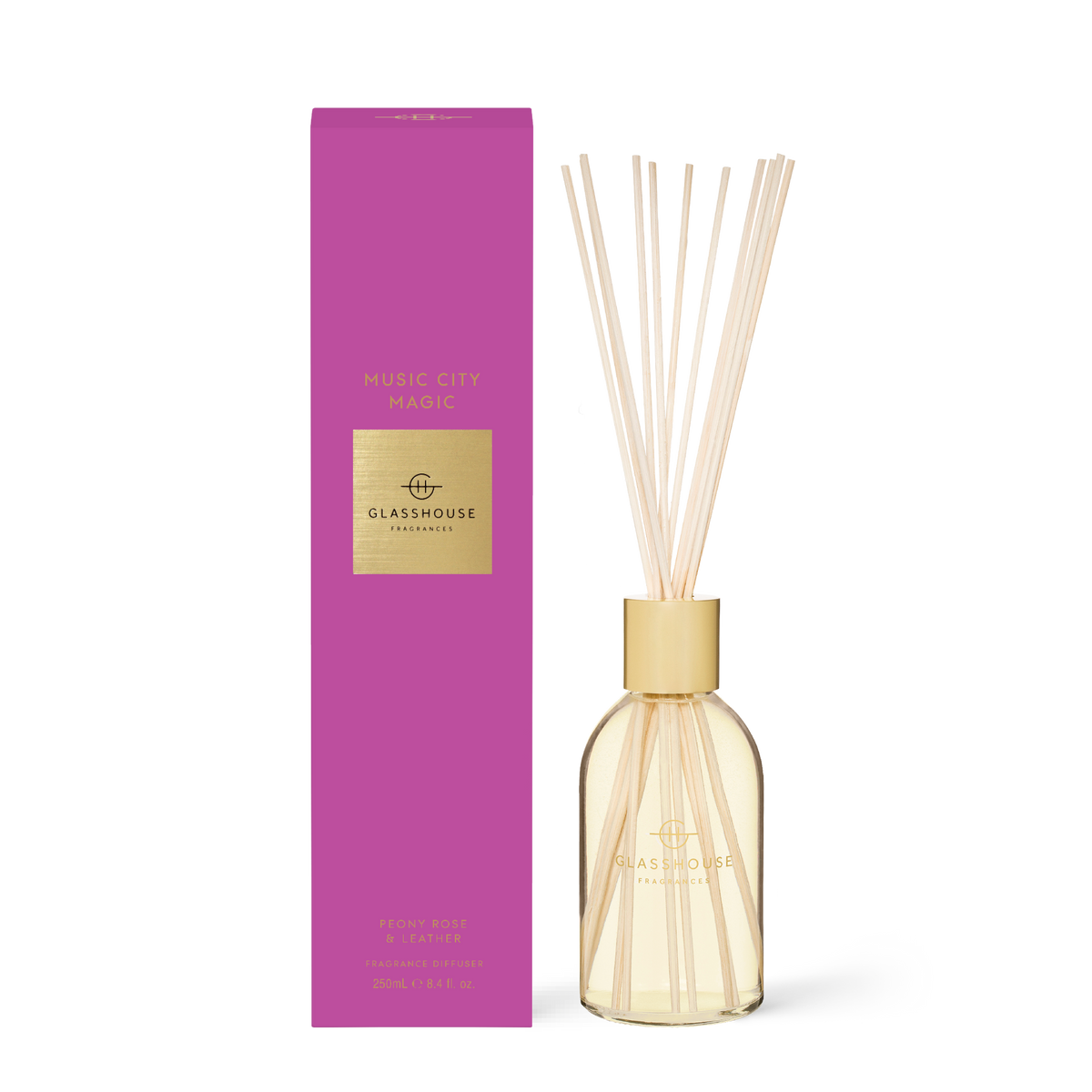 8.4 fl oz Music City Magic diffuser with amber violet peony rose leather scent in a clear bottle.