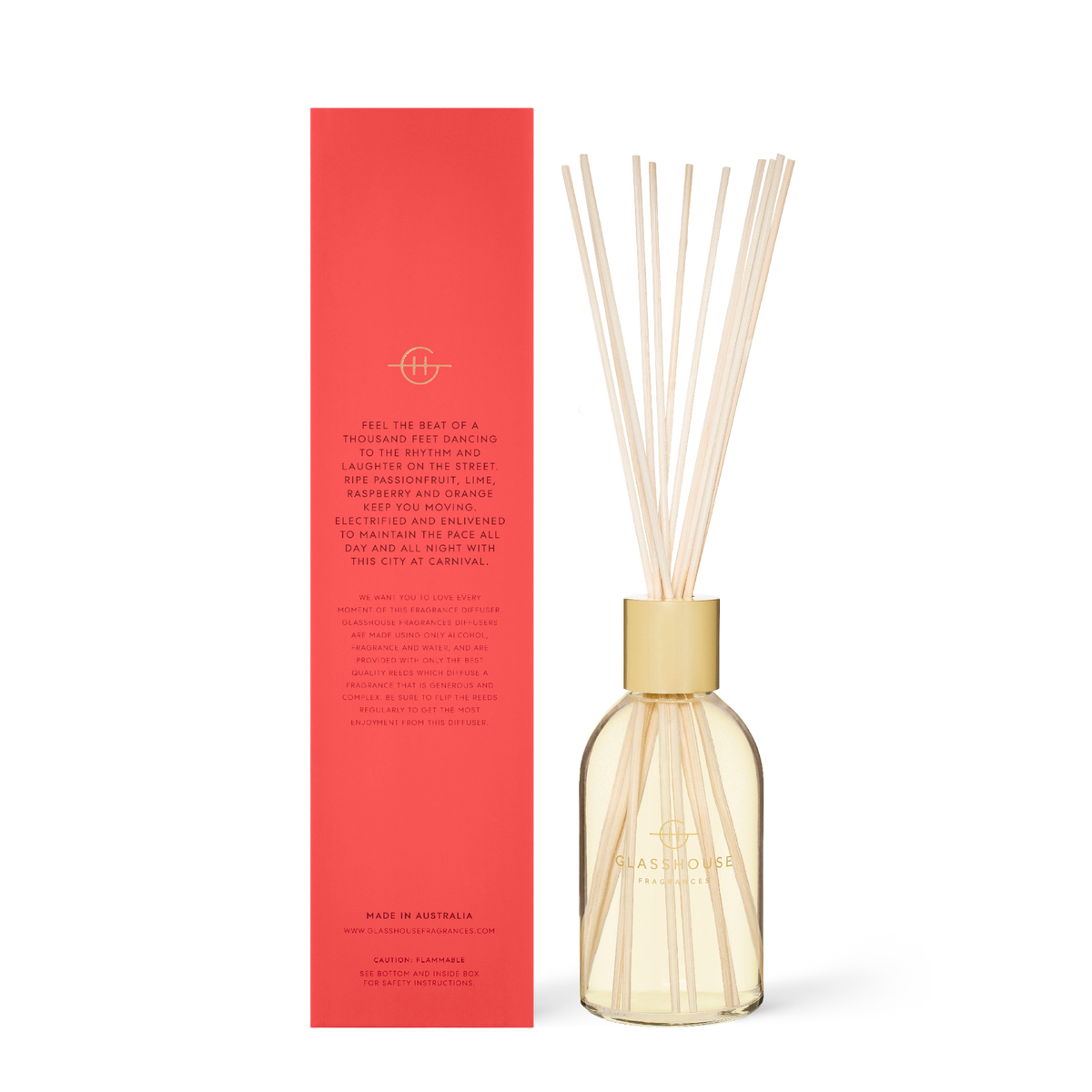 Glasshouse One Night in Rio diffuser with clear glass bottle containing pale yellow liquid and dark reeds.