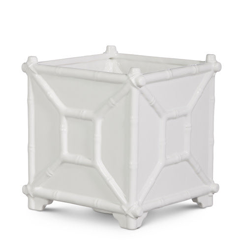 White ceramic planter with bamboo crisscross detailing on an octagonal silhouette.