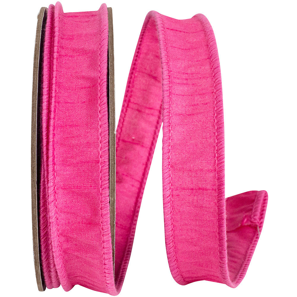 7/8 inch wide shocking pink dupioni wired edge ribbon with a smooth texture and straight cut.