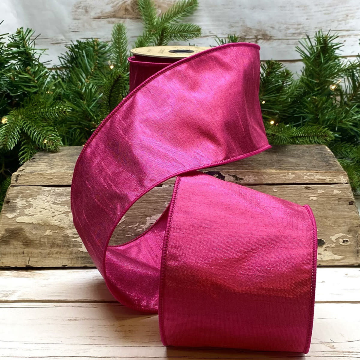 4-inch wide metallic dupion ribbon in shimmering silver with a smooth satin finish.