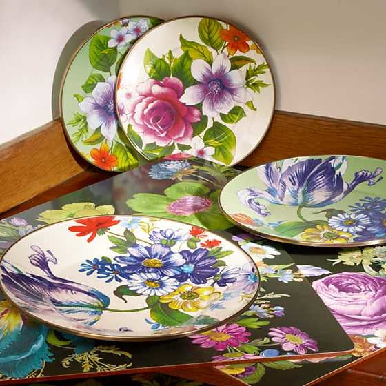 Green flower market salad plate with hand-applied floral transfers on color-glazed enamelware and bronzed stainless steel rim.