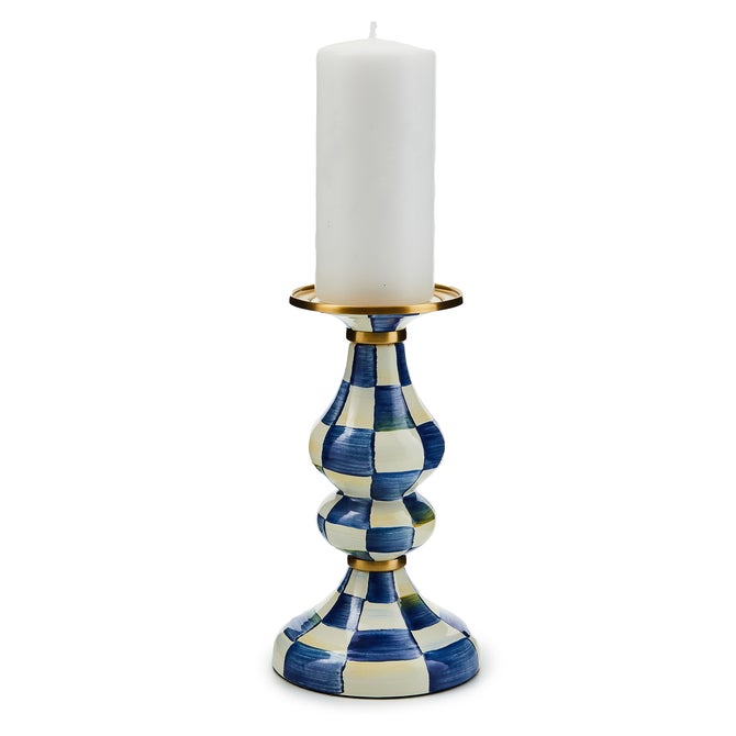 Royal blue hand-painted check pillar candlestick with brass accents on bronzed stainless steel.