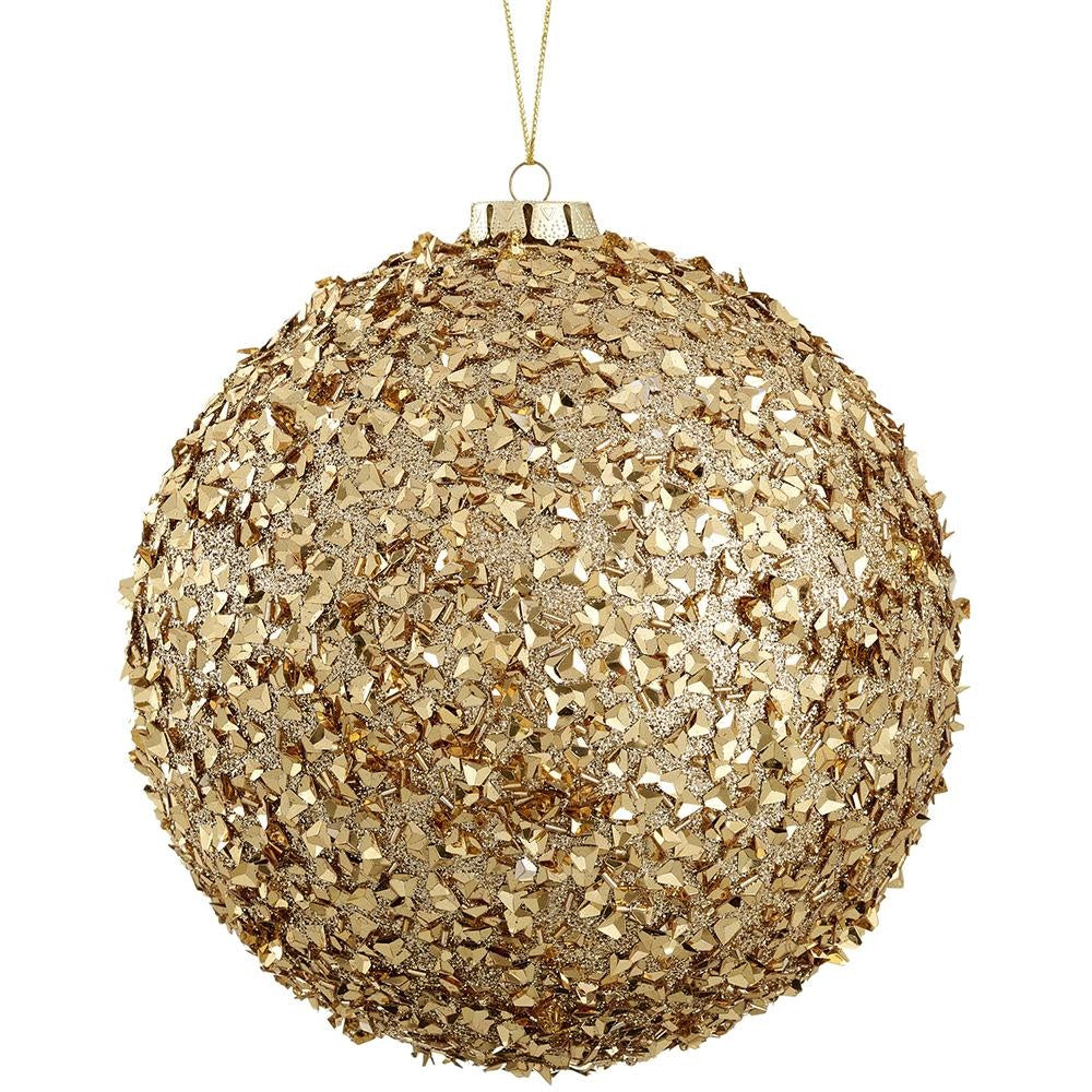 Eight-inch gold glittered ball ornament with beaded texture on a festive tree.