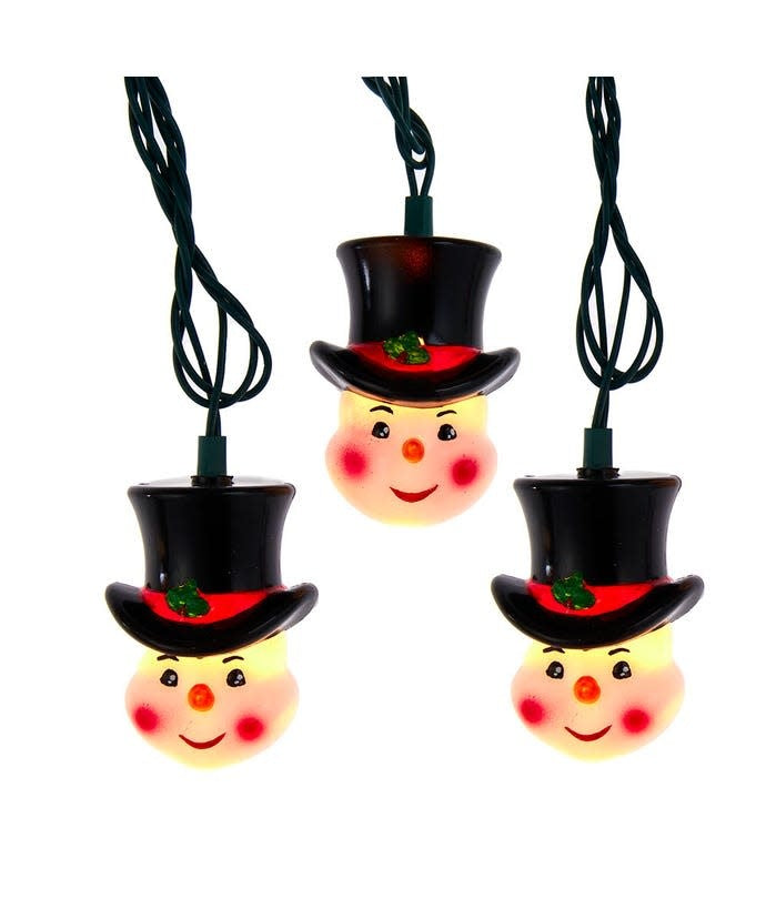Multicolor snowman head light set with clear incandescent bulbs on a green wire.