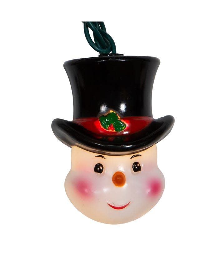 Multicolor snowman head light set with clear incandescent bulbs on a green wire.
