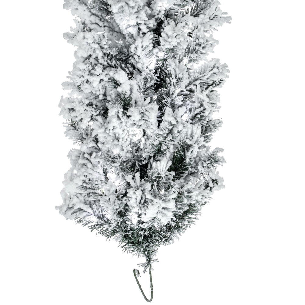 Pre-lit flocked Alaskan garland with warm white mini LEDs on a wire spine.