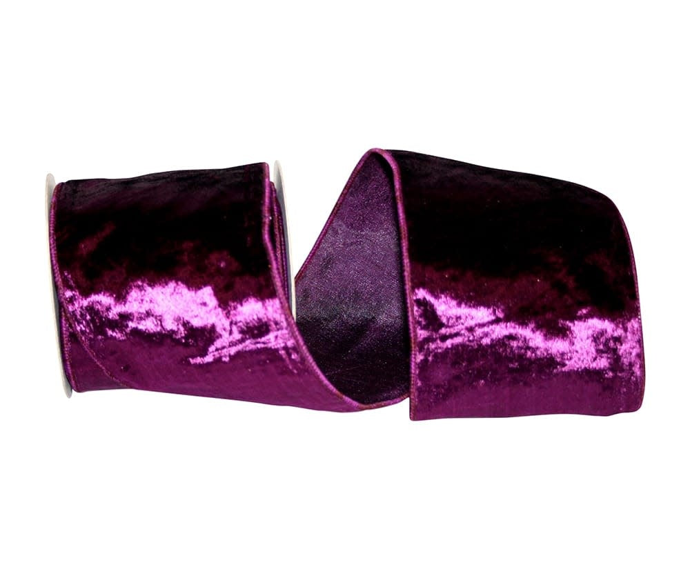 Four-inch wide shimmery velvet ribbon with wired edge in dark green