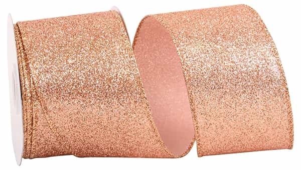 Rose gold wired edge ribbon with scalloped trim on a white background.