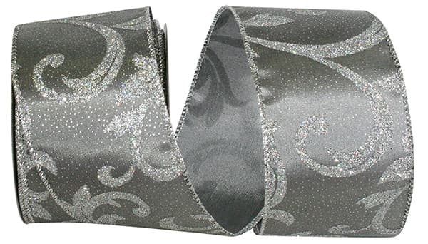 Gold glitter filigree leaf wired edge ribbon on black taffeta background