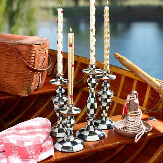 Medium Courtly Check enamel candlestick with hand-painted high-contrast checks on enameled steel and bronzed stainless rim.