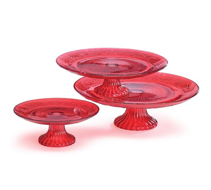 Pressed red glass cake plate with raised rim detail.