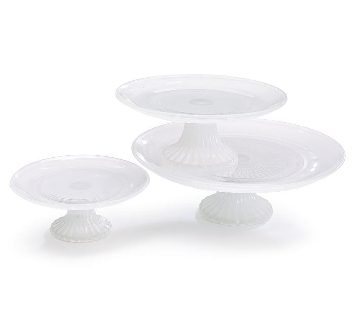 Pressed white milk glass cake plate with raised finish