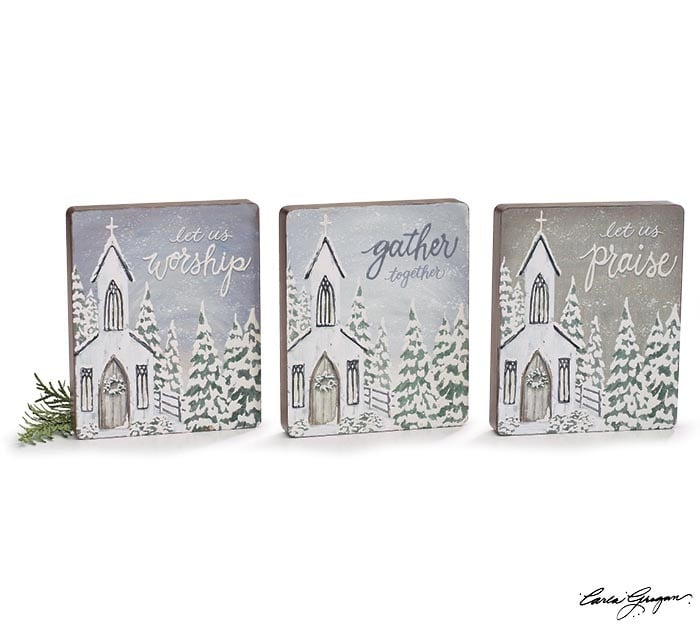 Hand-painted wooden shelf sitter featuring a snowy church scene with 'let us praise' text on natural wood.