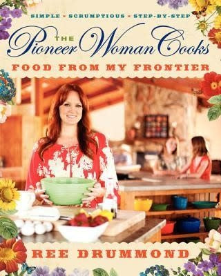 Hardcover cookbook The Pioneer Woman Cooks: Food From My Frontier featuring Ree Drummond on the cover.