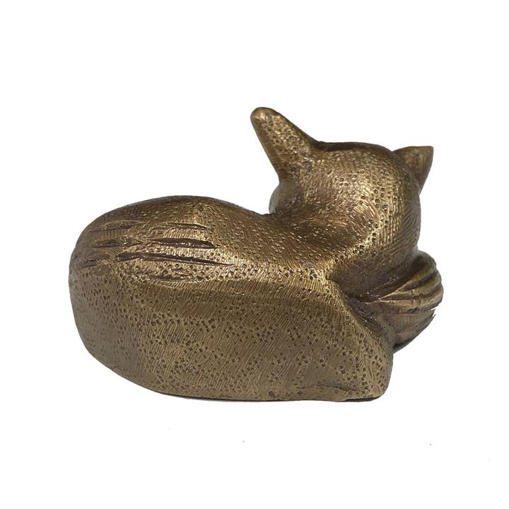 Antiqued brass sleeping fox figurine with etched detailing, viewed from the back.