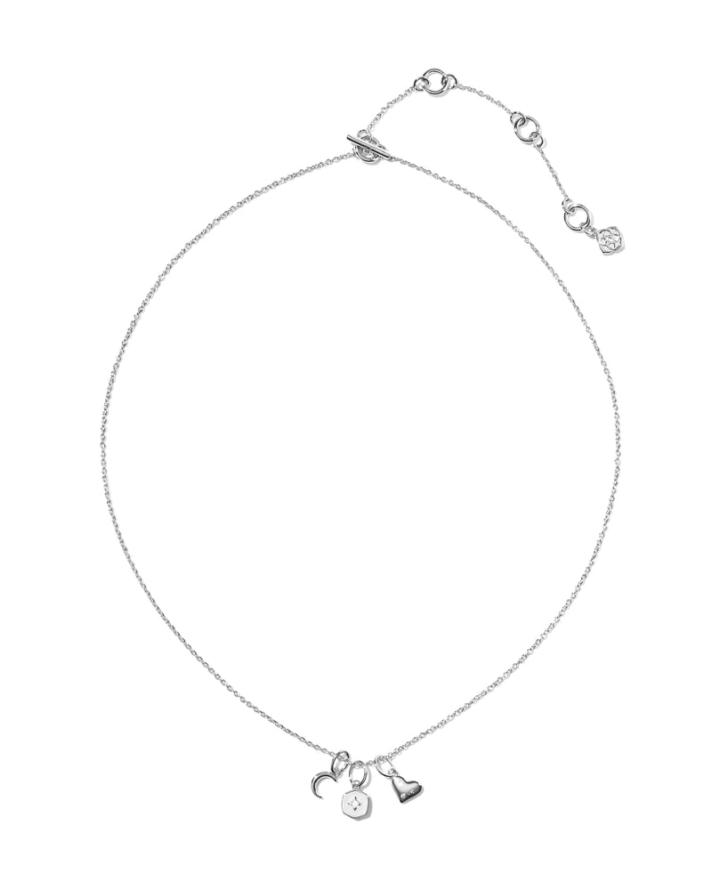 Arlene Charm Necklace in silver with crescent moon, star-set hexagon, and heart charms.