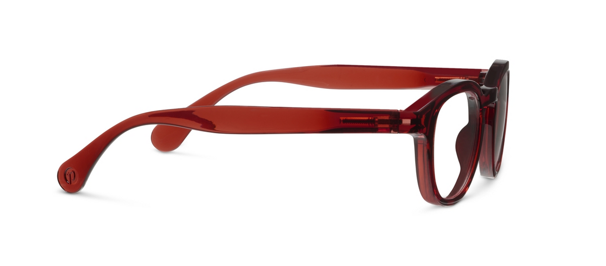 Side view of Asher round, chunky cranberry red translucent glasses with spring hinges.