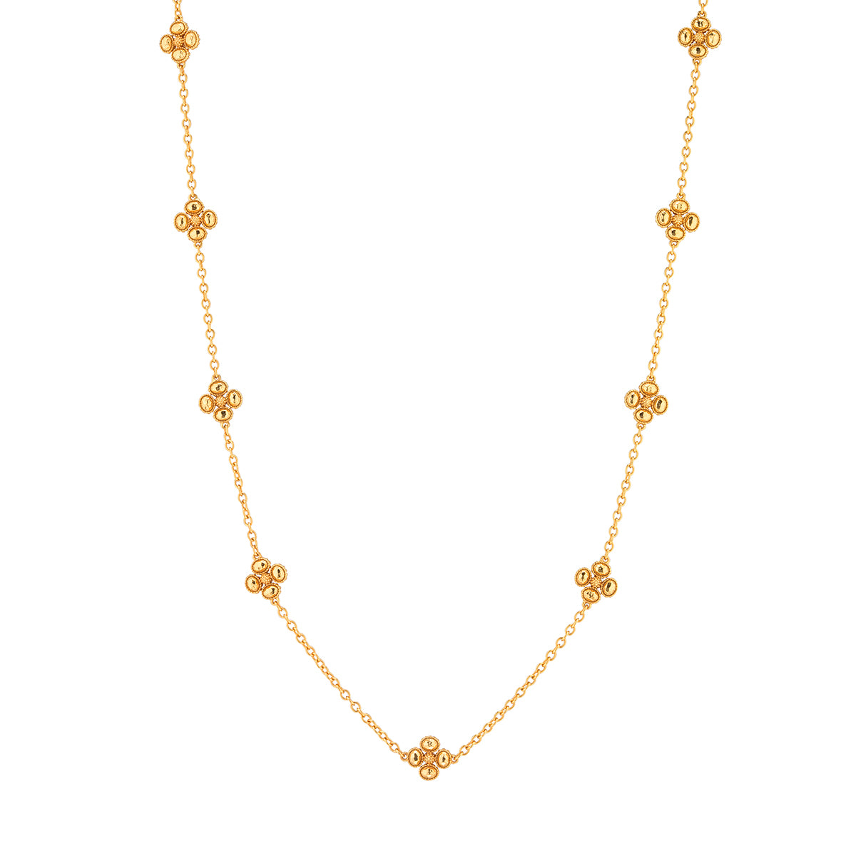 Gold 28-inch station-set chain necklace with nine textured clover motifs.