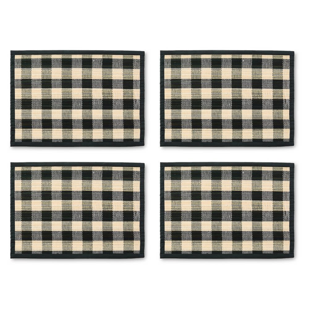 Woven check straw placemat in black with cotton accents