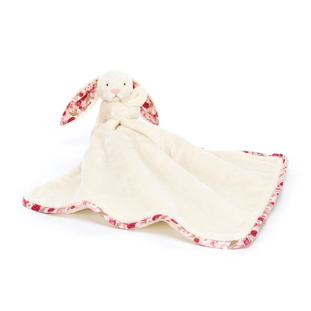 Cream bunny soother blanket with floral patterned ears and trim.