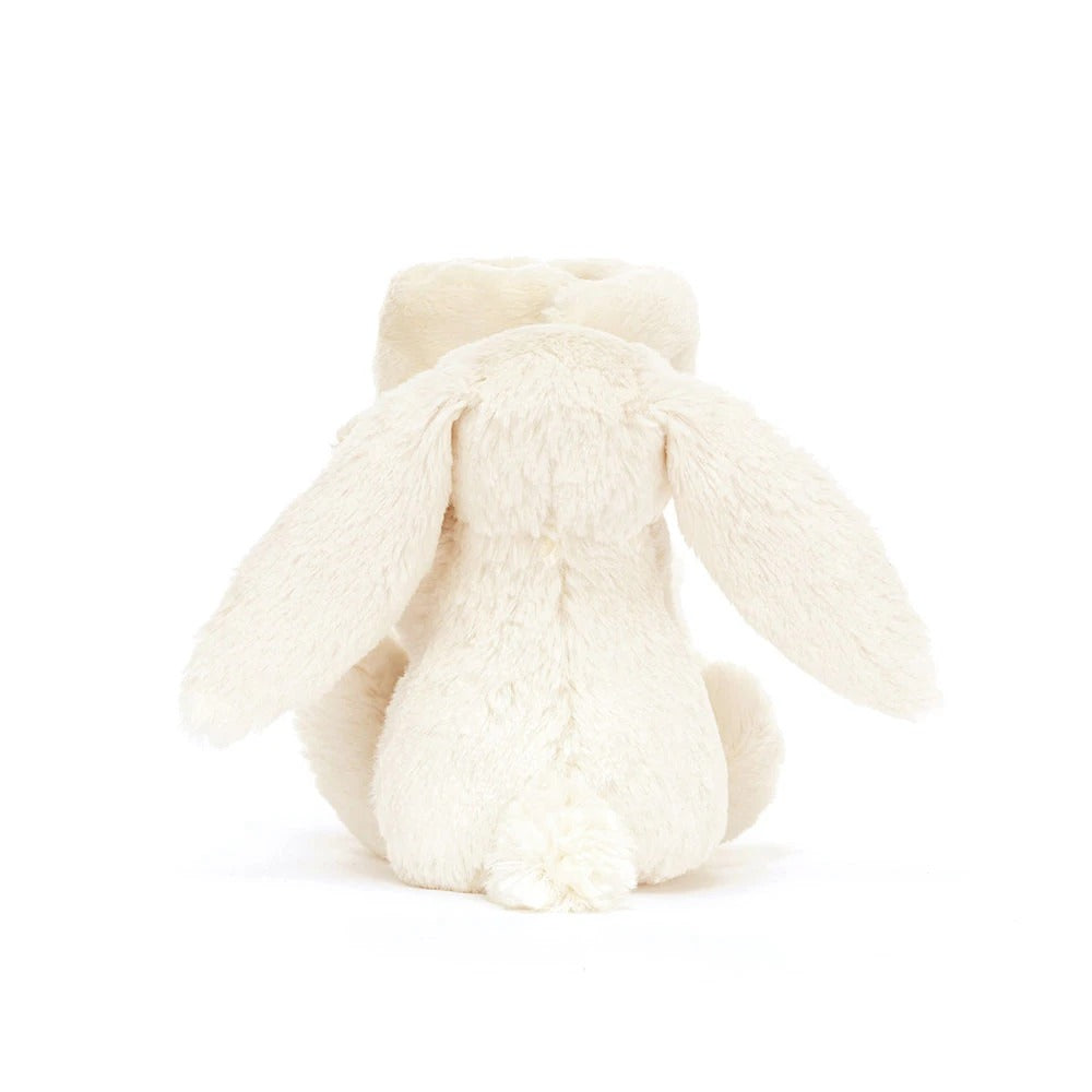 Rear view of a Blossom Cream Bunny 'Berry' Soother, a plush cream bunny attached to a soft blanket.