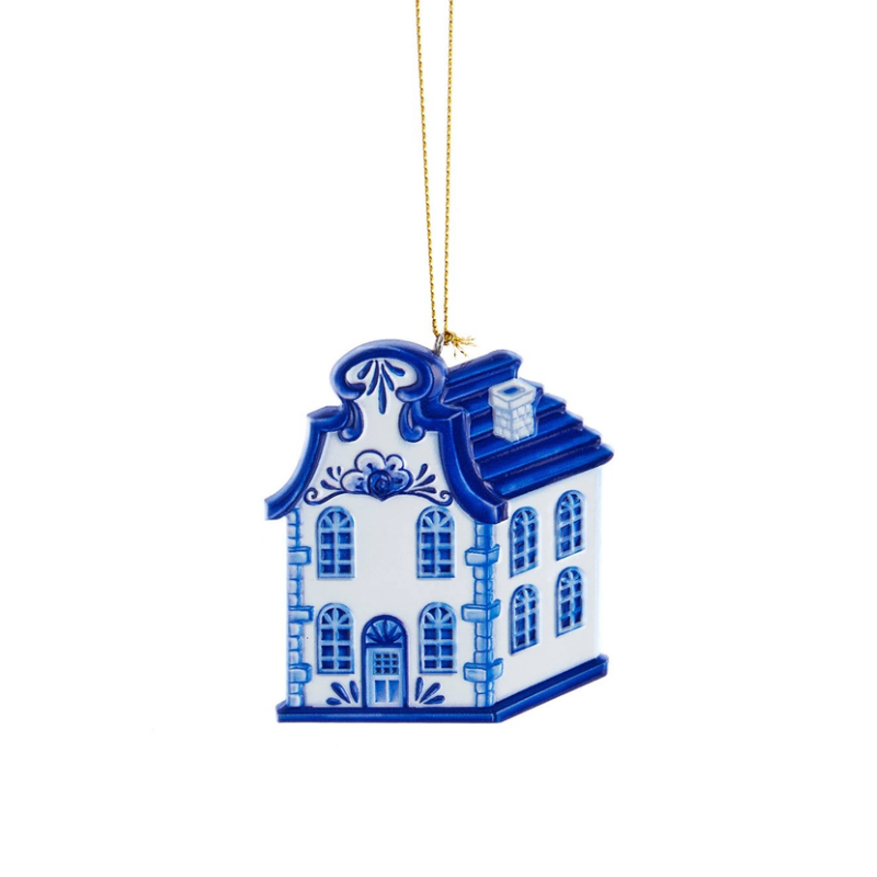 Blue and white resin house ornament with a Dutch-style gable and gold hanging string.