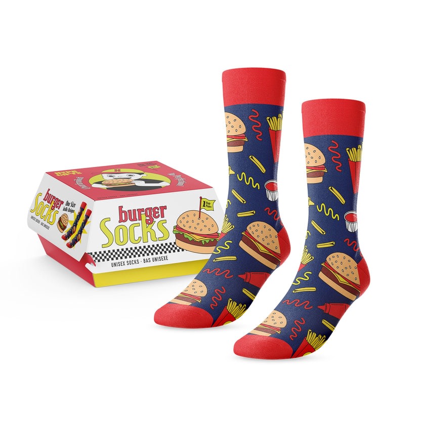A pair of navy blue burger and fries patterned socks next to their burger-themed gift box.