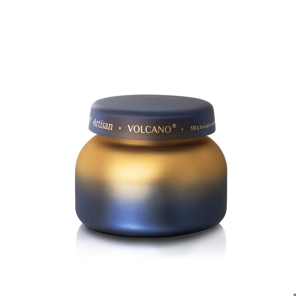 Capri Blue Volcano Artisan Tuscan Radiance Signature Candle in a matte blue and gold ombré jar.