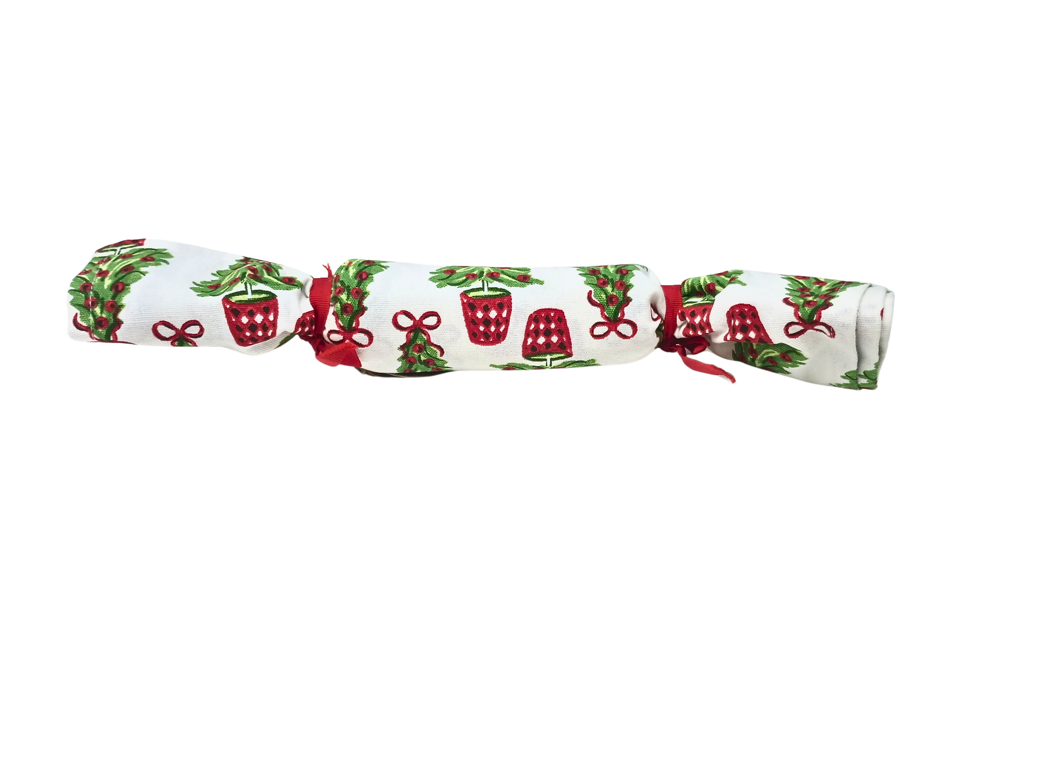 Rolled Christmas block print cotton towel with green tree and red pot design tied with red ribbons.