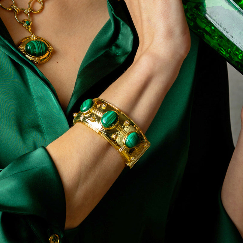 Cleopatra Grande Hinged Bangle in hammered 18K gold plated brass with three malachite gemstones.