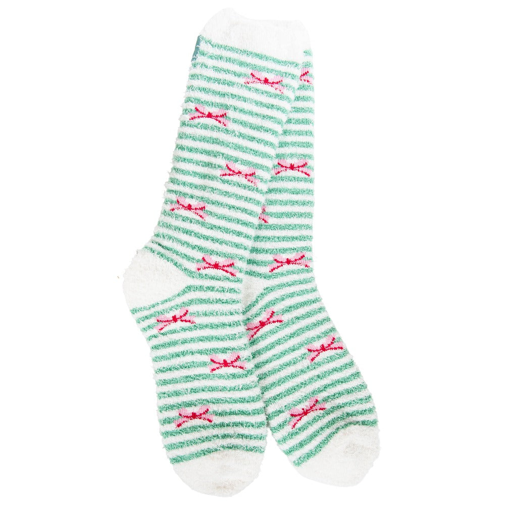 White and green striped cozy crew socks with pink holiday bow patterns.