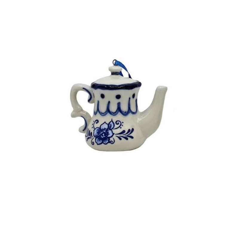 Delft blue and white ceramic teapot ornament with floral design and blue hanging ribbon.