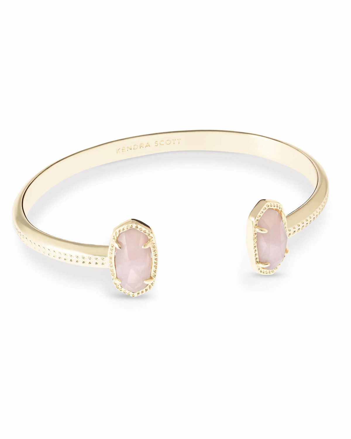 Gold Elton Cuff Bracelet with two oval rose quartz stones on an open, adjustable band.