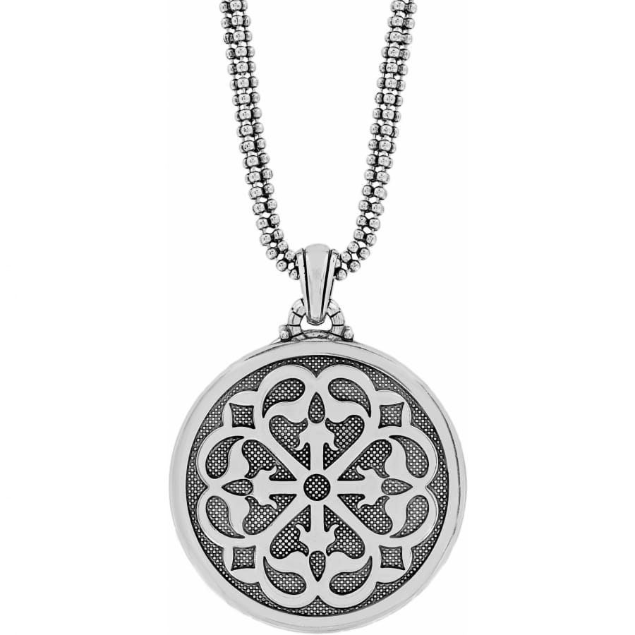 Silver-plated Ferrara necklace with a round pendant featuring a pierced arabesque pattern.